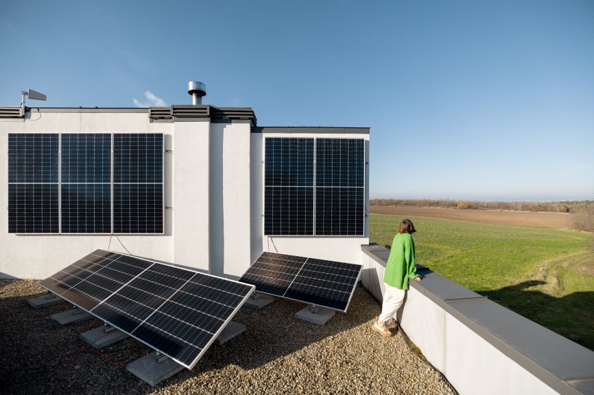 Home solar panels installed on a south-facing Dallas roof under clear blue skies