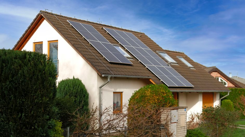 Eco friendly cabin with off grid solar panels in the countryside