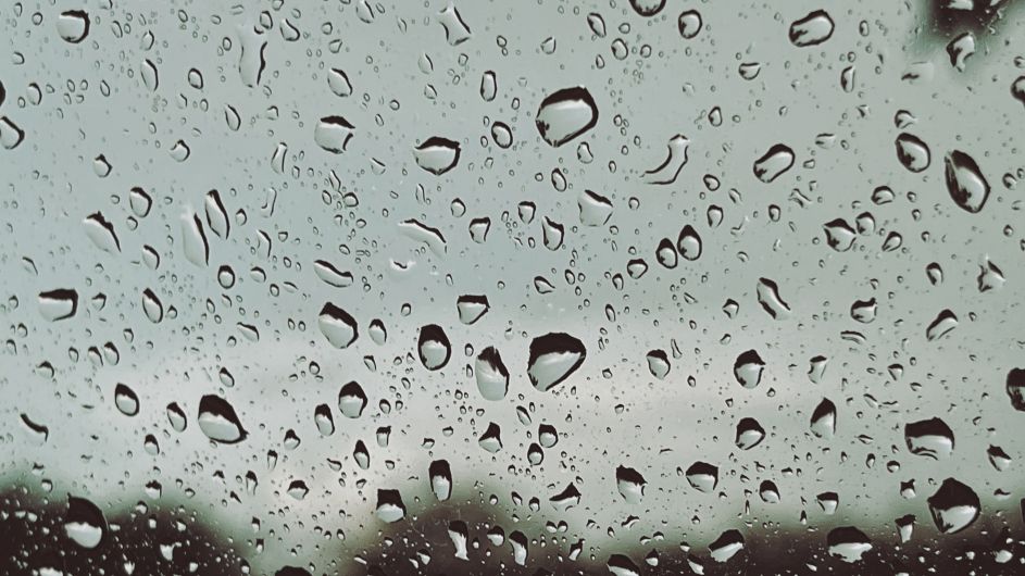 Close-up of solar glass surface with water droplets by First Solar installers