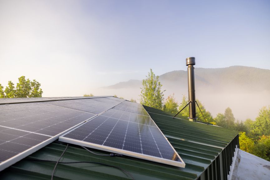 Sunlit off-grid solar panel home installation by First Solar company
