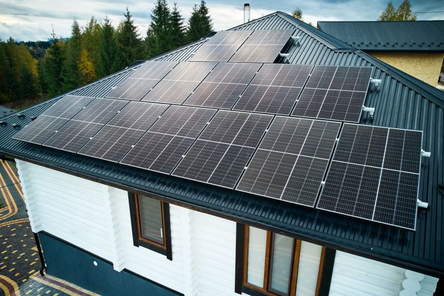 best solar panel hire first Solar installers setting up an off-grid solar panel system for a residential property