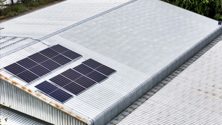 Corrugated metal roof with solar panels installed by First Solar Installers - Can You Put Solar Panels on a Metal Roof?