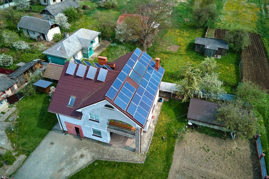 Colored Solar Panels installed on a modern suburban home by First Solar Installers